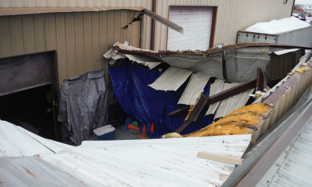 Collapsed Roof Due to Heavy Snow in Bull Rogers, NM